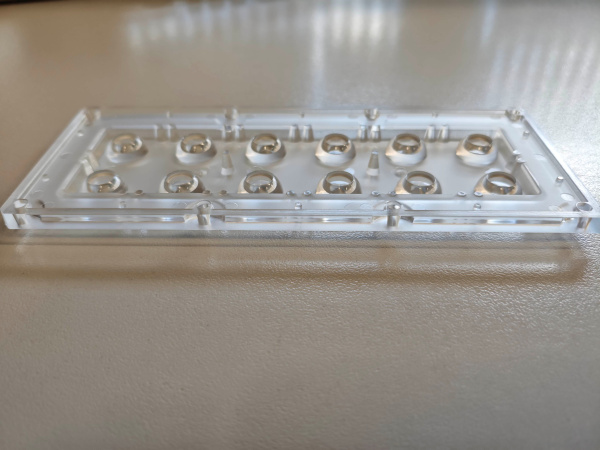 173071 PLR125002KR-PMMA, Светодиодная оптика мультилинза 2X6 с IP защитой, симметричная, КСС, 90 градусов без уплотнителя, Катод Рус